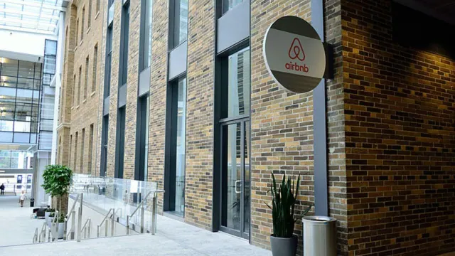 An Airbnb sign outside a building