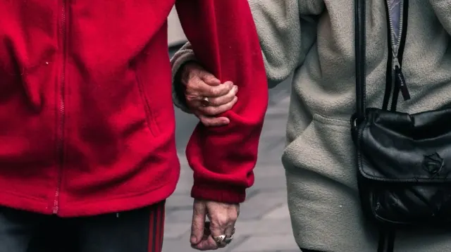 Two adults walking together