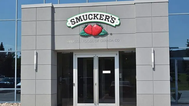 A Smucker’s sign on a building