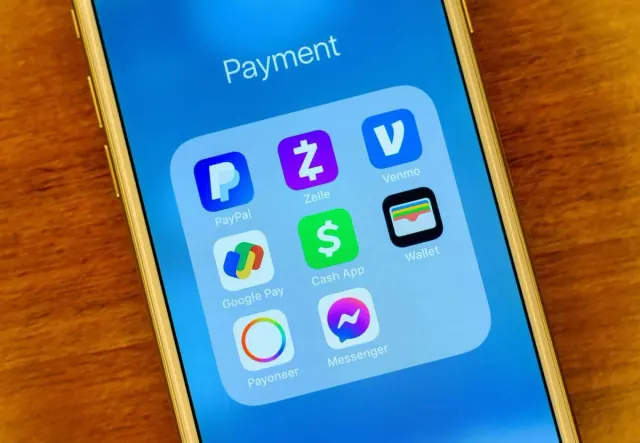 Smartphone showing app icons for several payment apps