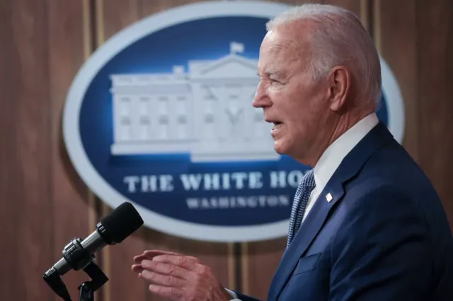 Archival photograph of Joe Biden speaking at the White House