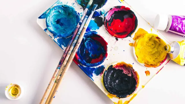 A palette of paints and brushes