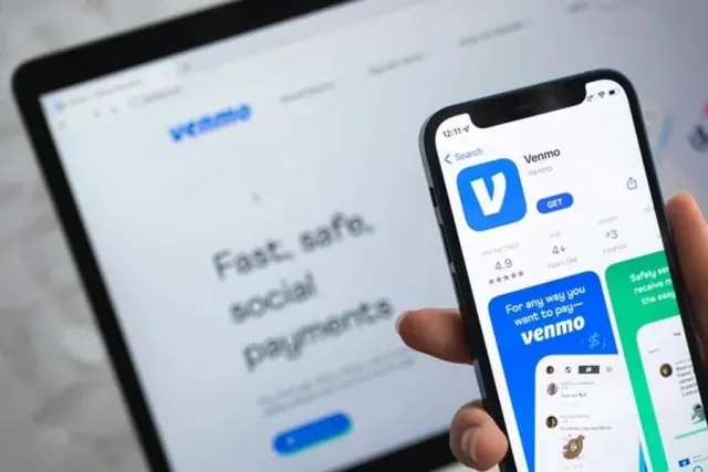 Venmo open on both a computer and a smartphone