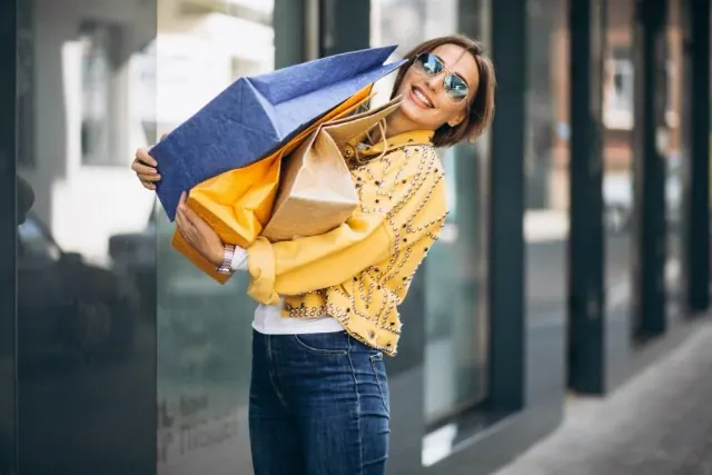 A person holding shopping bags