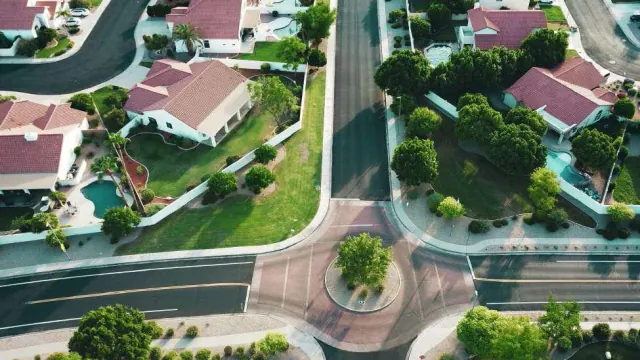 Aerial view of homes and a roundabout