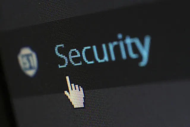 The word Security in blue letters on a black background
