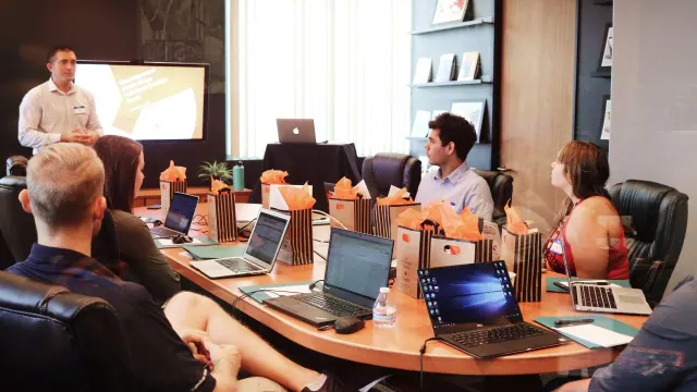 A group meeting around a conference table