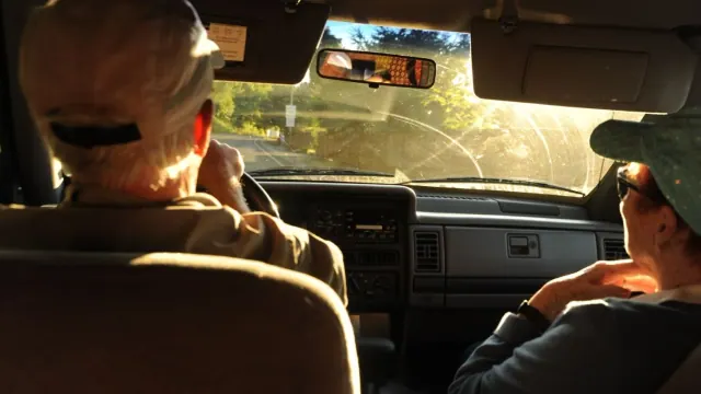 Two people inside a vehicle