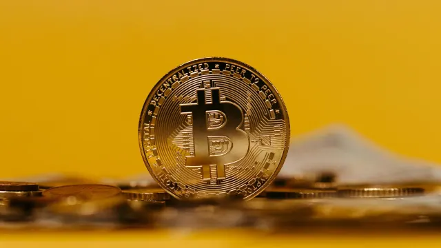 Bitcoin agaisnt yellow background