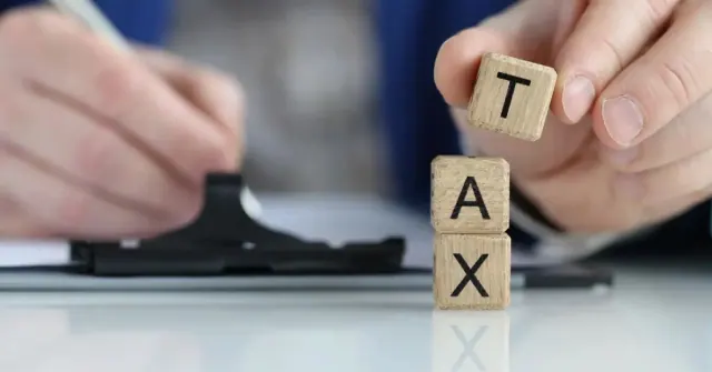 Letter tiles spelling tax