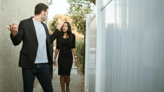 A staged image of two people in an argument