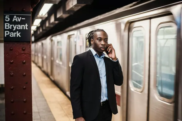 A commuter on a New York subway platform