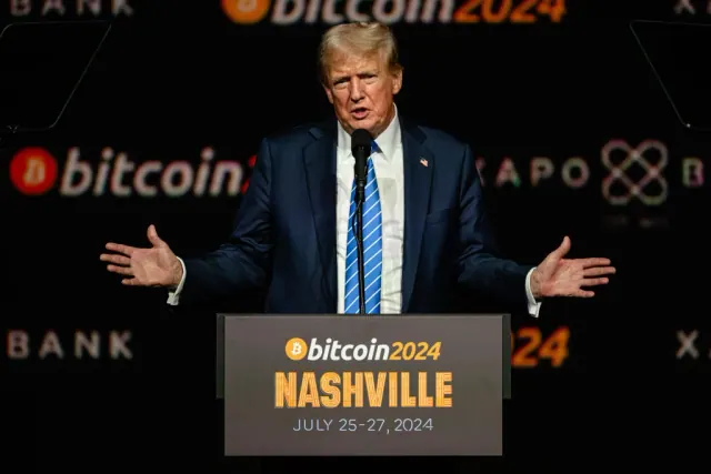 NASHVILLE, TENNESSEE - JULY 27: Former President and 2024 Republican presidential candidate Donald Trump gestures while giving a keynote speech on the third day of the Bitcoin 2024 conference at Music City Center July 27, 2024 in Nashville, Tennessee. The conference, which is aimed at bitcoin enthusiasts, features multiple vendor and entertainment spaces and seminars by celebrities and politicians.