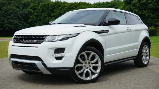 White Range Rover parked on a street
