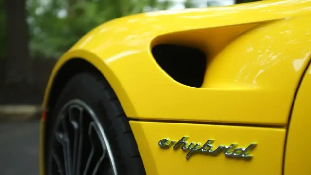 Close-up of a yellow car with LaFerrari script