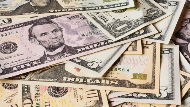 An overlapping assortment of United States banknotes